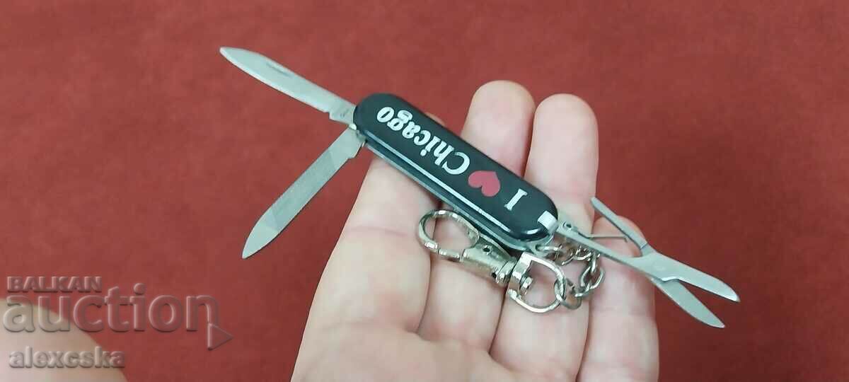 Livrarea Mini cuțit - breloc Livrarea Mini cuțit - breloc