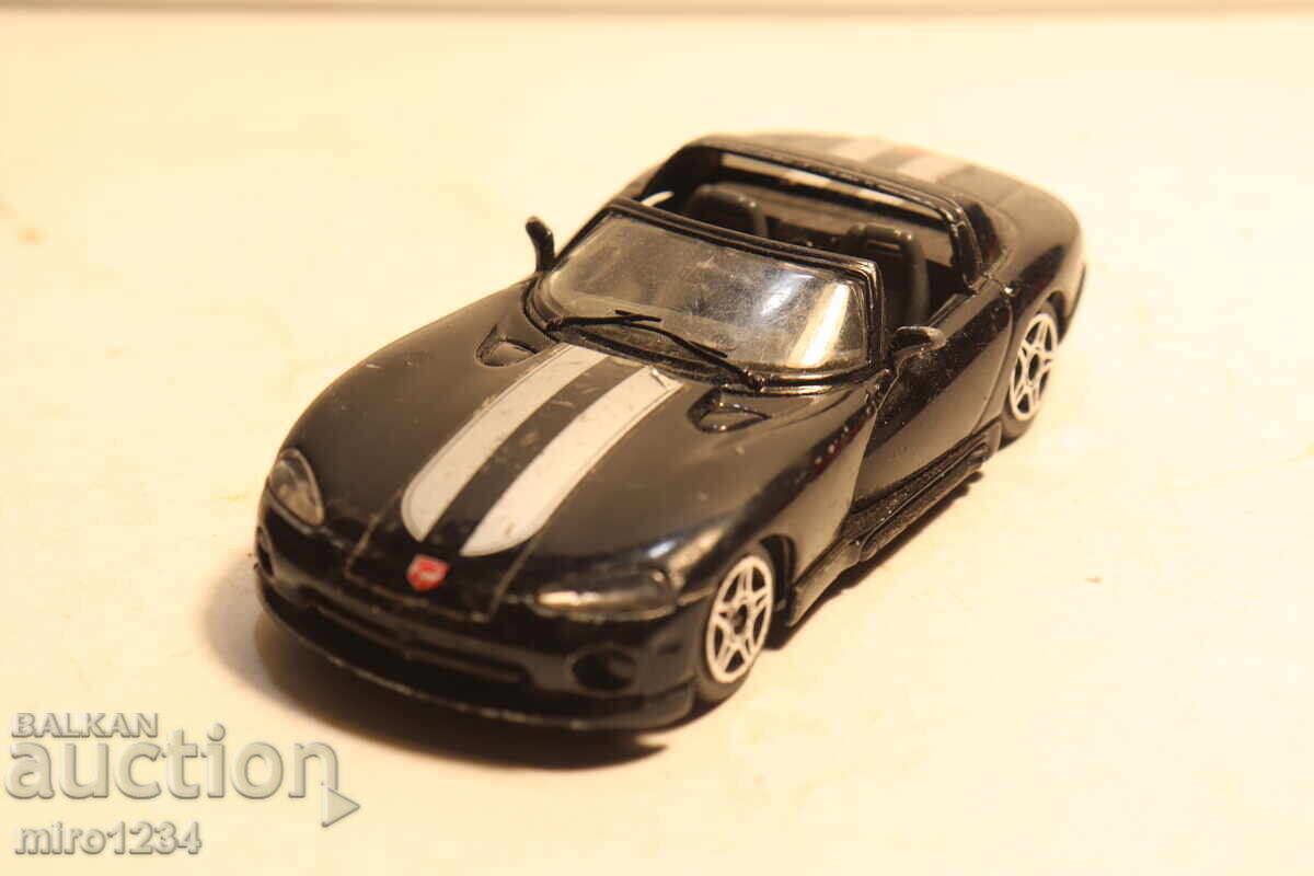 Licitație MAȘINUȚĂ MODEL DODGE VIPER 1/43 BBURAGO Licitație MAȘINUȚĂ MODEL DODGE VIPER 1/43 BBURAGO