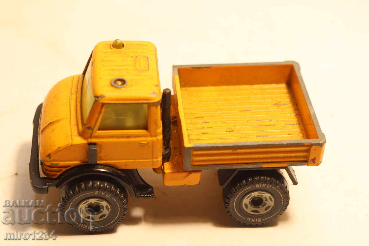 1/50??? SIKU MERCEDES UNIMOG MAȘINUȚĂ MODEL cu preț € 0.01 | 0.02 BGN 1/50??? SIKU MERCEDES UNIMOG MAȘINUȚĂ MODEL cu preț € 0.01 | 0.02 BGN