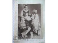 Fotografie veche cu un cuplu de balet dansând la o petrecere