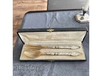 French salad serving utensils with silver handles