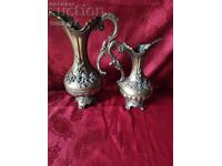 These are vintage decorative jugs/vases (ewers) in Baroque style
