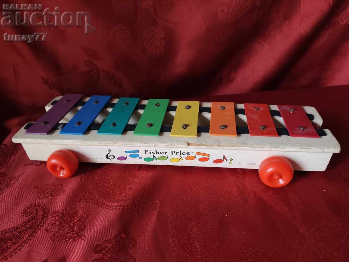 Xilofon muzical pentru copii pe roți de la marca Fisher-Price