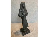 Old statue of the Egyptian goddess Isis