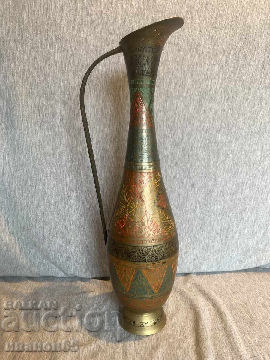Old engraved brass pitcher vase