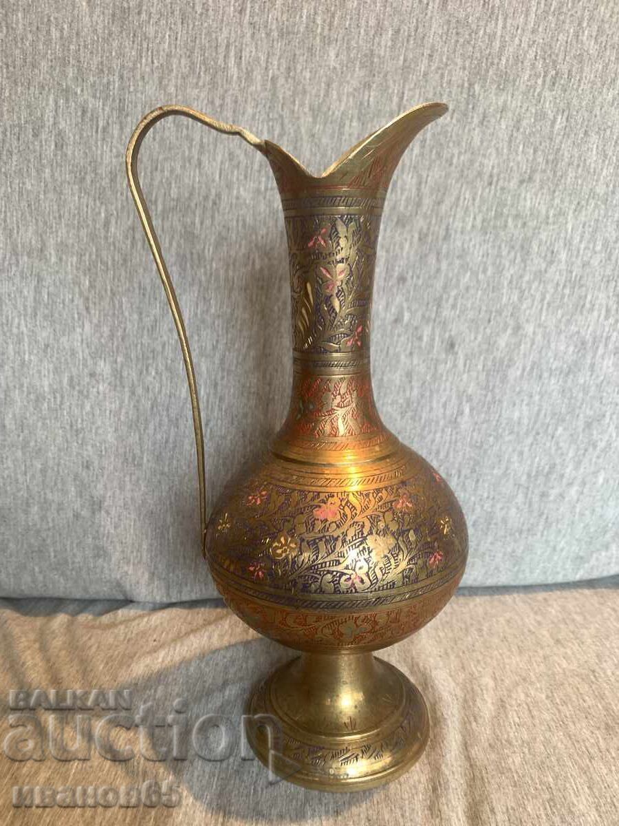 Old engraved brass pitcher vase