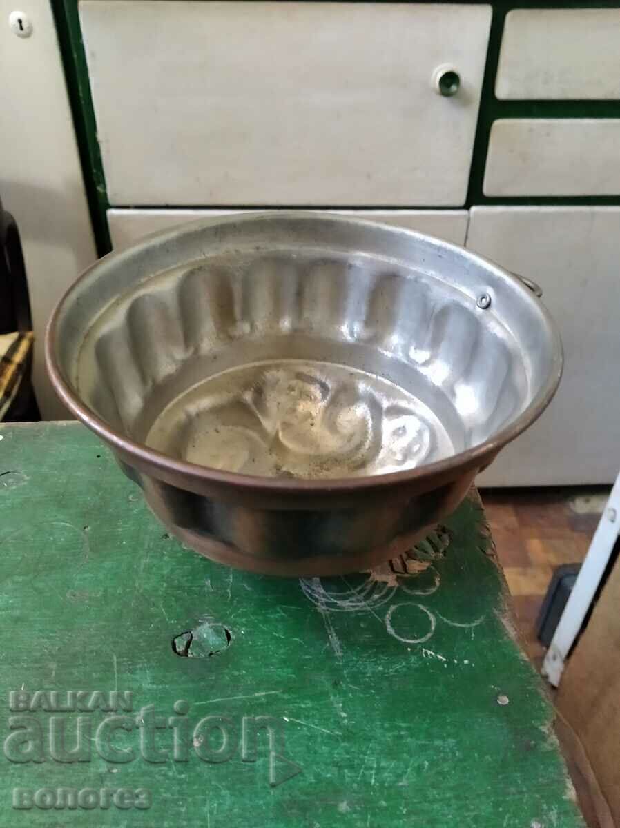 Old copper cake mold