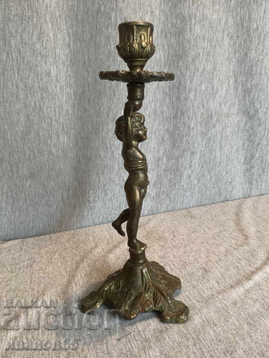 Brass candlestick holder for a candle with an angel with price € 30.00 | 58.68 BGN Brass candlestick holder for a candle with an angel with price € 30.00 | 58.68 BGN