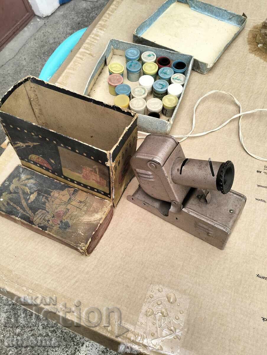 Vintage film projector with 20 films