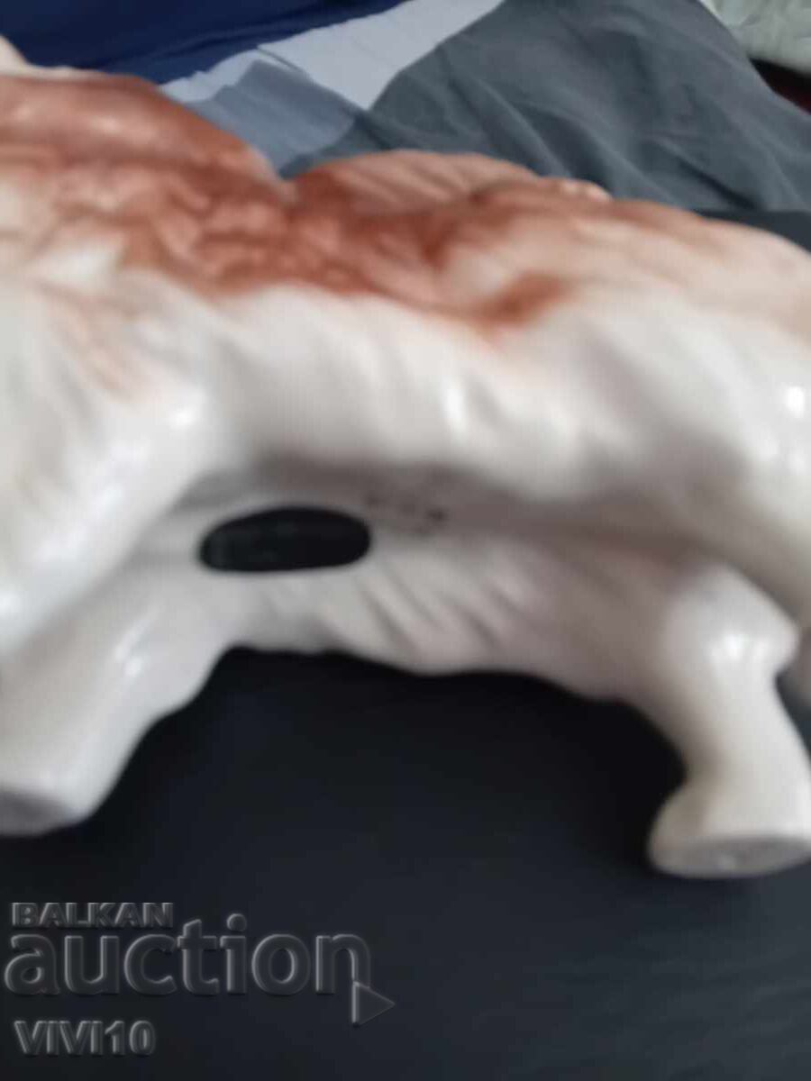 Auction Antique porcelain figurine, Pomeranian Auction Antique porcelain figurine, Pomeranian