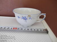 Porcelain cup for coffee, tea, and others