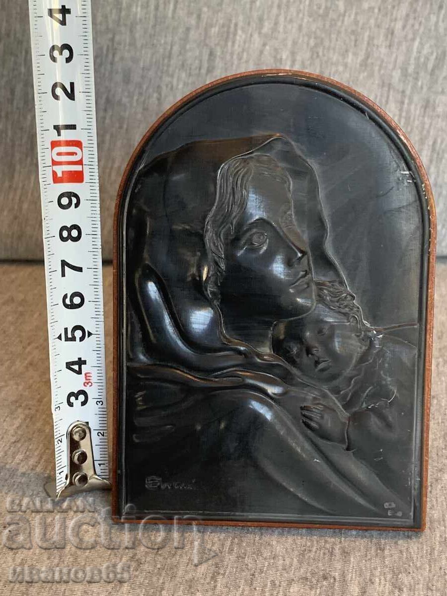 Madonna and Child on a wooden back with a stand Madonna and Child on a wooden back with a stand