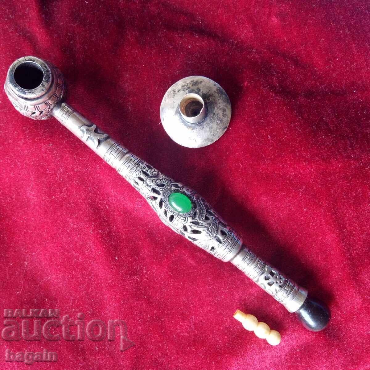 Auction  Opium smoking pipe