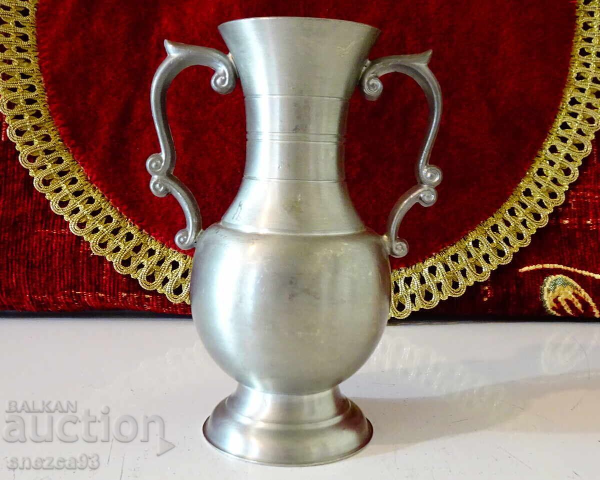 Pewter pitcher, vase, candlestick Pewter pitcher, vase, candlestick