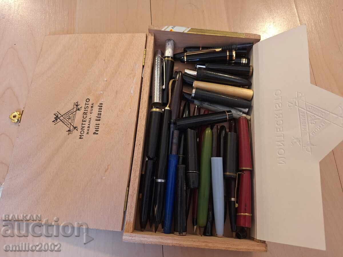 Cigar box with pen parts