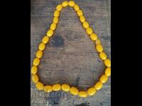 Imitation amber necklace made of lightweight plastic/resin
