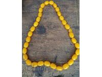 Imitation amber necklace made of lightweight plastic/resin