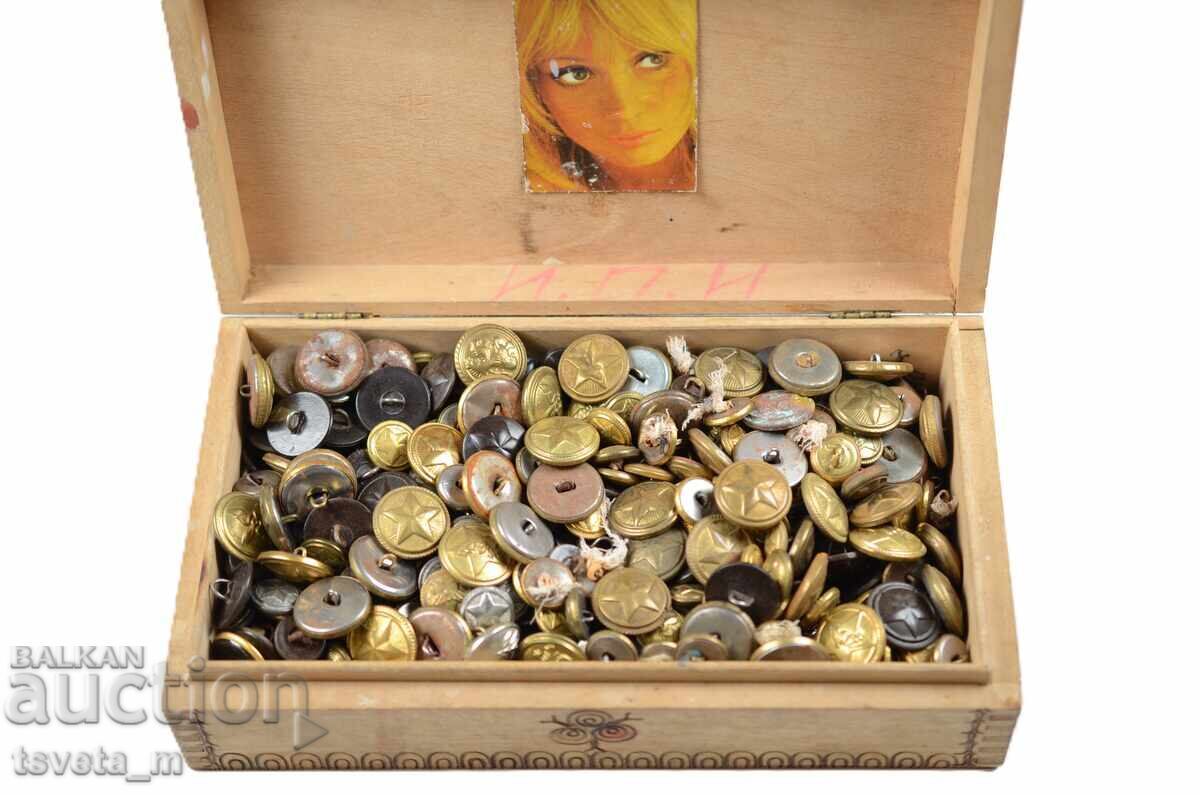 Wooden box filled with military buttons with price € 10.00 | 19.56 BGN