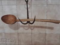 Very old wooden spoon, ladle, wooden