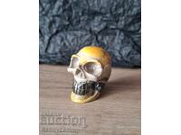 Skull made of a rare mineral, volcanic lava