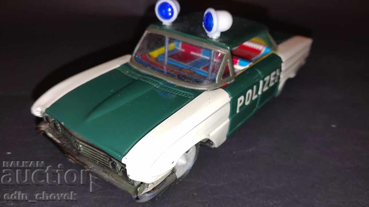 Jucărie veche din tablă mașină de poliție cu sirene mobile cu preț € 0.01 | 0.02 BGN