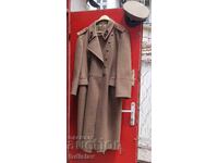 Socialist-era officer's greatcoat and signal corps peaked cap