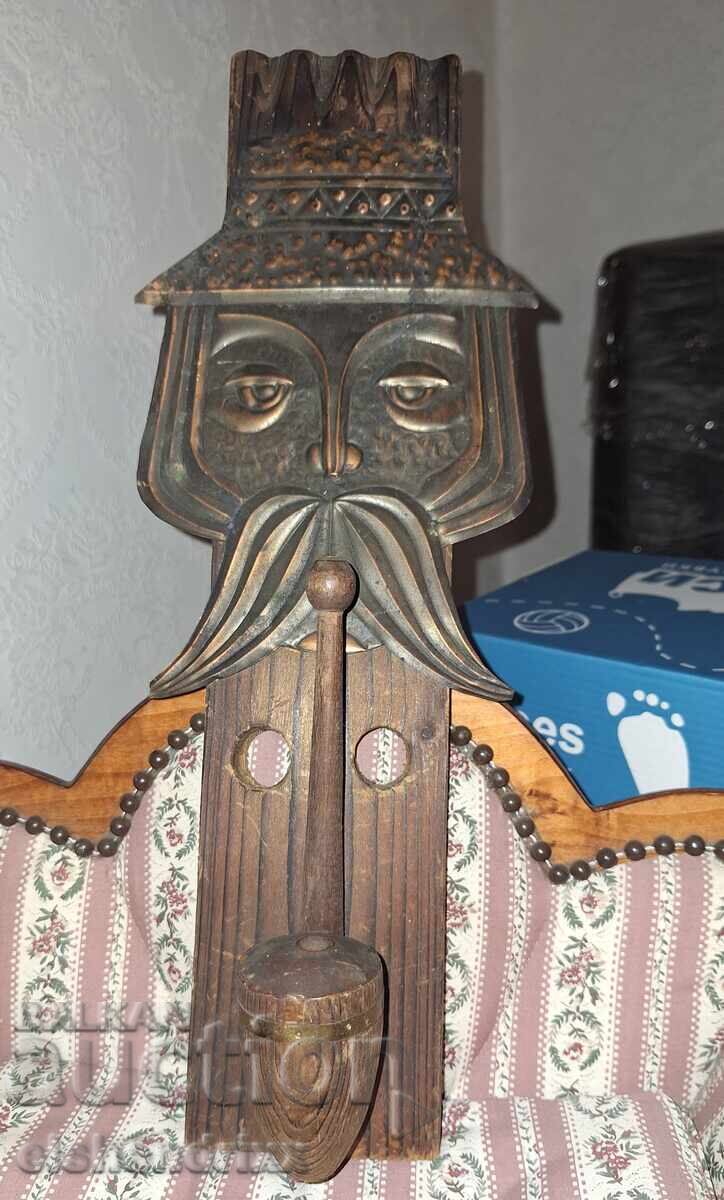 Wooden panel with metal elements
