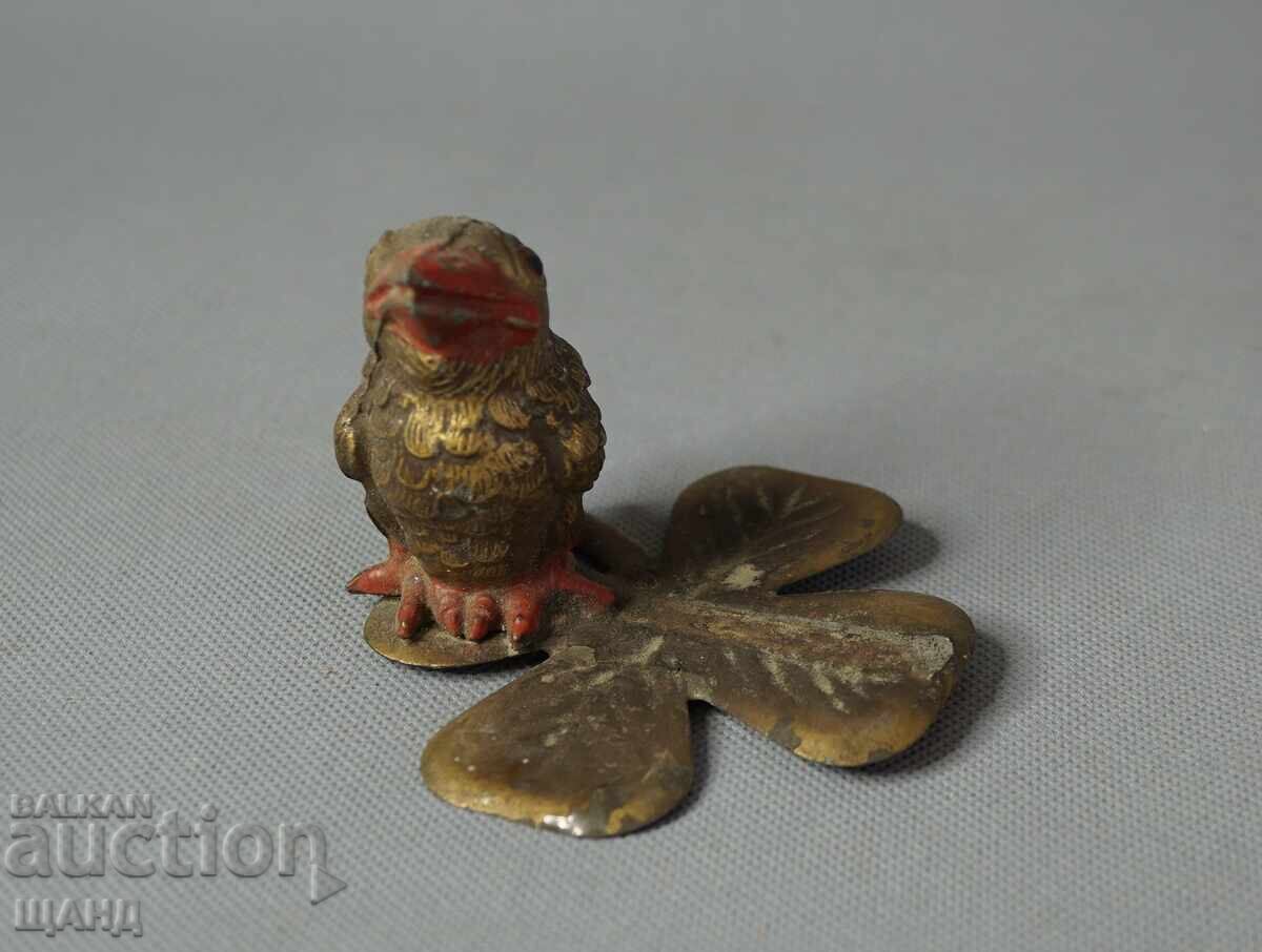 Auction  Vintage metal bird figurine on a leaf