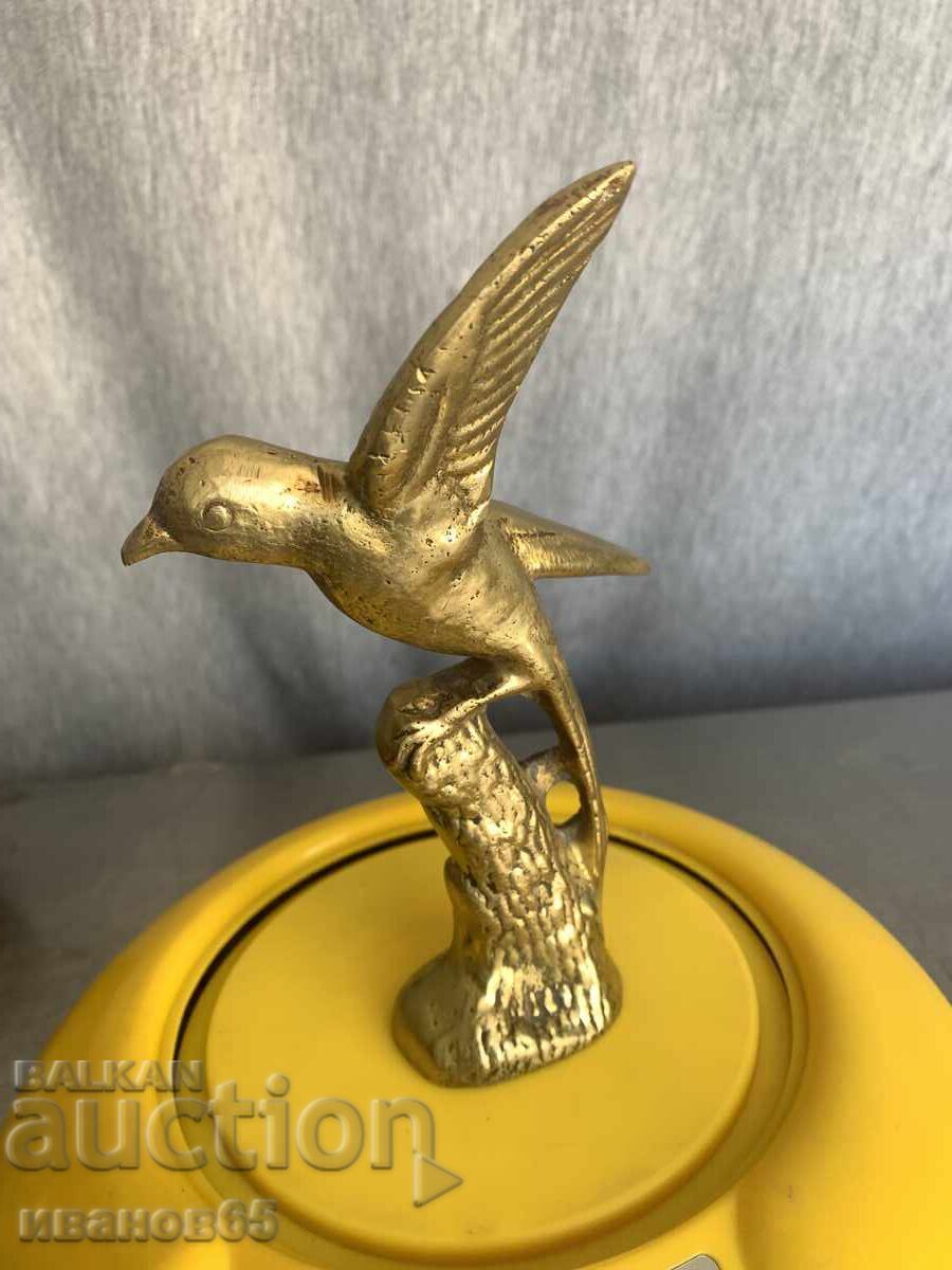 Auction  Brass bird sculpture