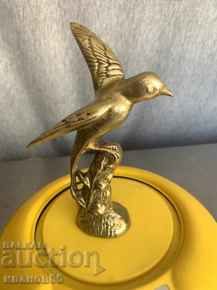 Delivery of Brass bird sculpture