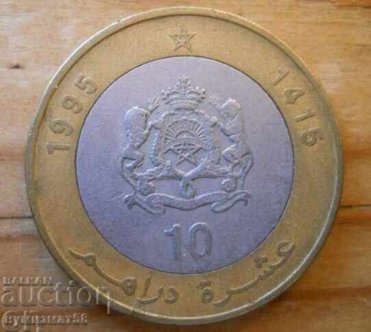 10 дирхама 1995 г - Мароко (биметал) 10 дирхама 1995 г - Мароко (биметал)