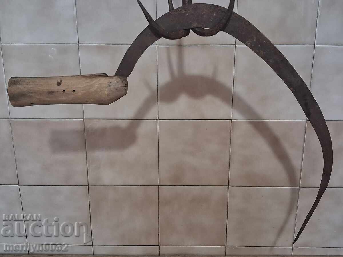 Old scythe, sickle, blade, wrought iron