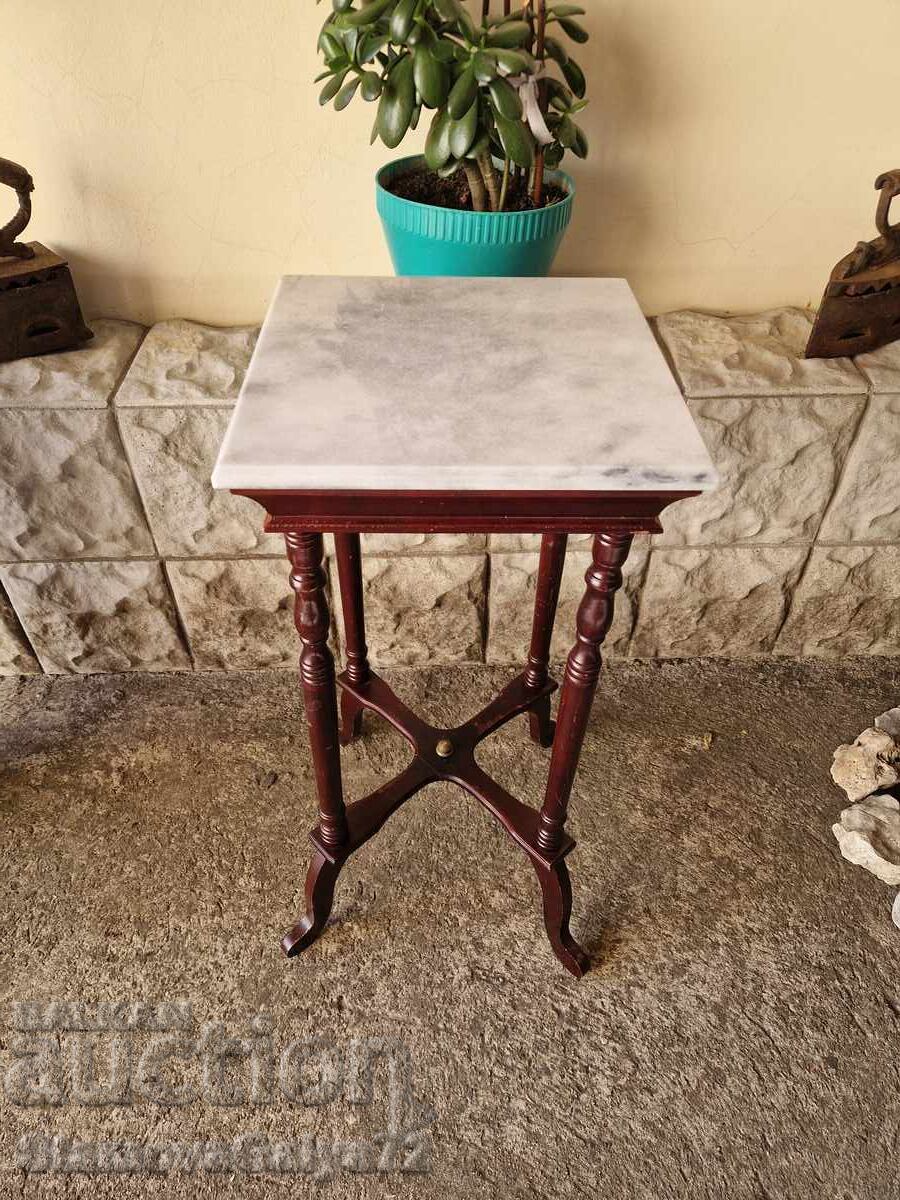 Unique antique French wooden side table with marble top Unique antique French wooden side table with marble top