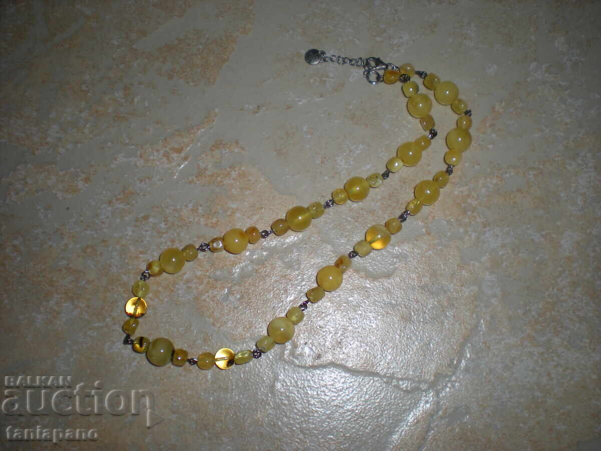 Auction  Baltic amber necklace, butter and lemon color