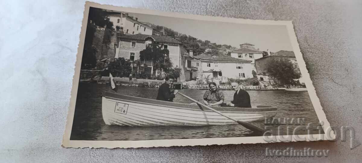 Photograph Two men and a woman with a boat on Lake Ohrid 1942