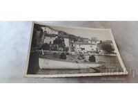 Photograph Two men and a woman with a boat on Lake Ohrid 1942