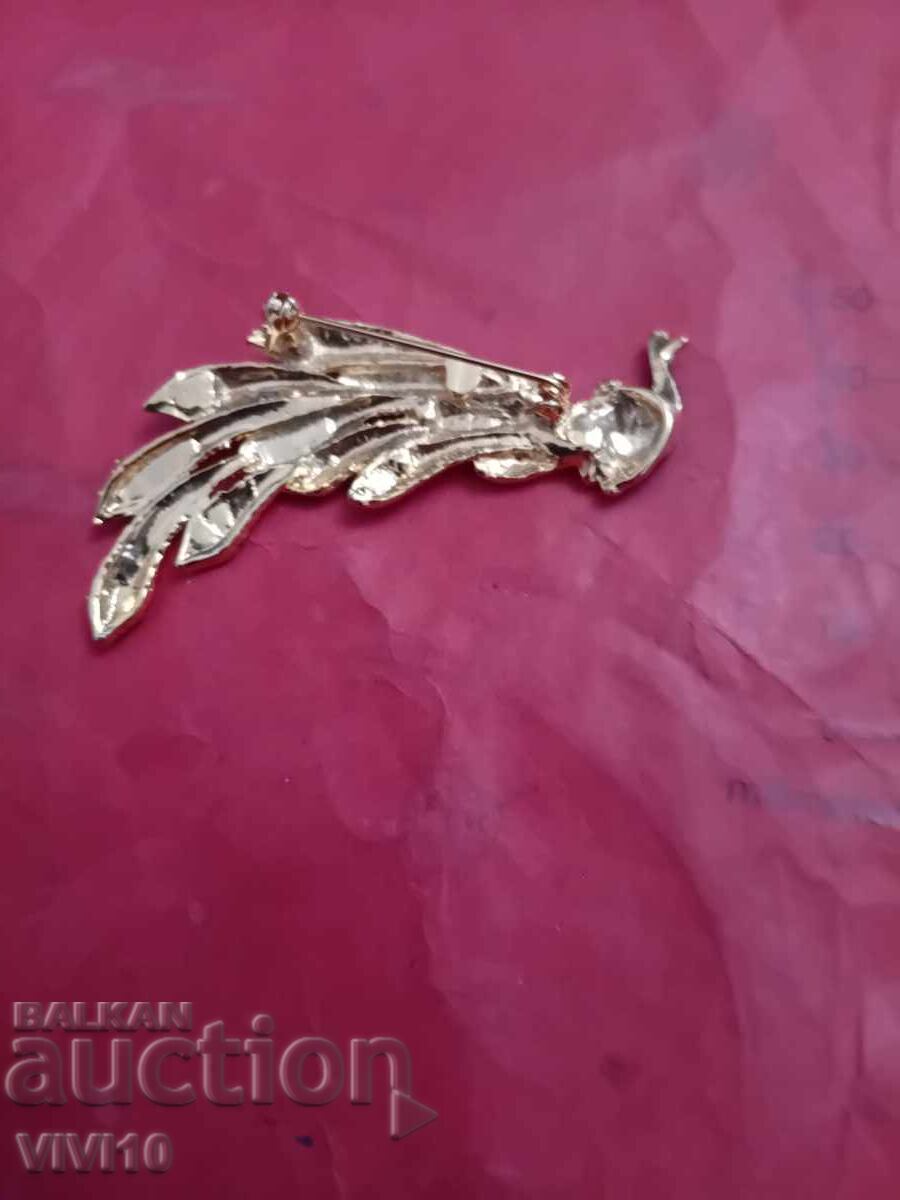 Auction  Antique enamel brooch, peacock