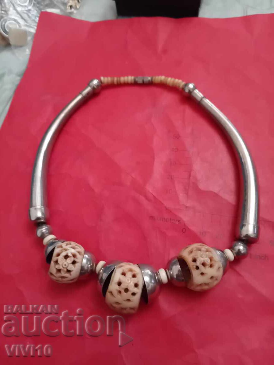 Antique necklace with metal and bone